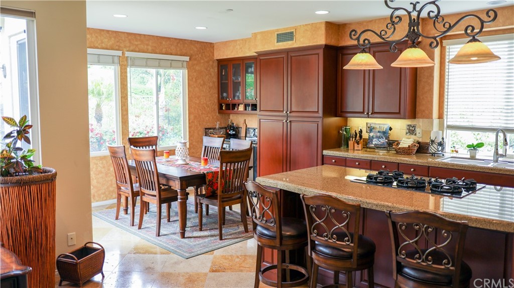 19 Calle Pacifica San Clemente, CA 92673 - Photo 4 of 10 a dining table with chairs and window