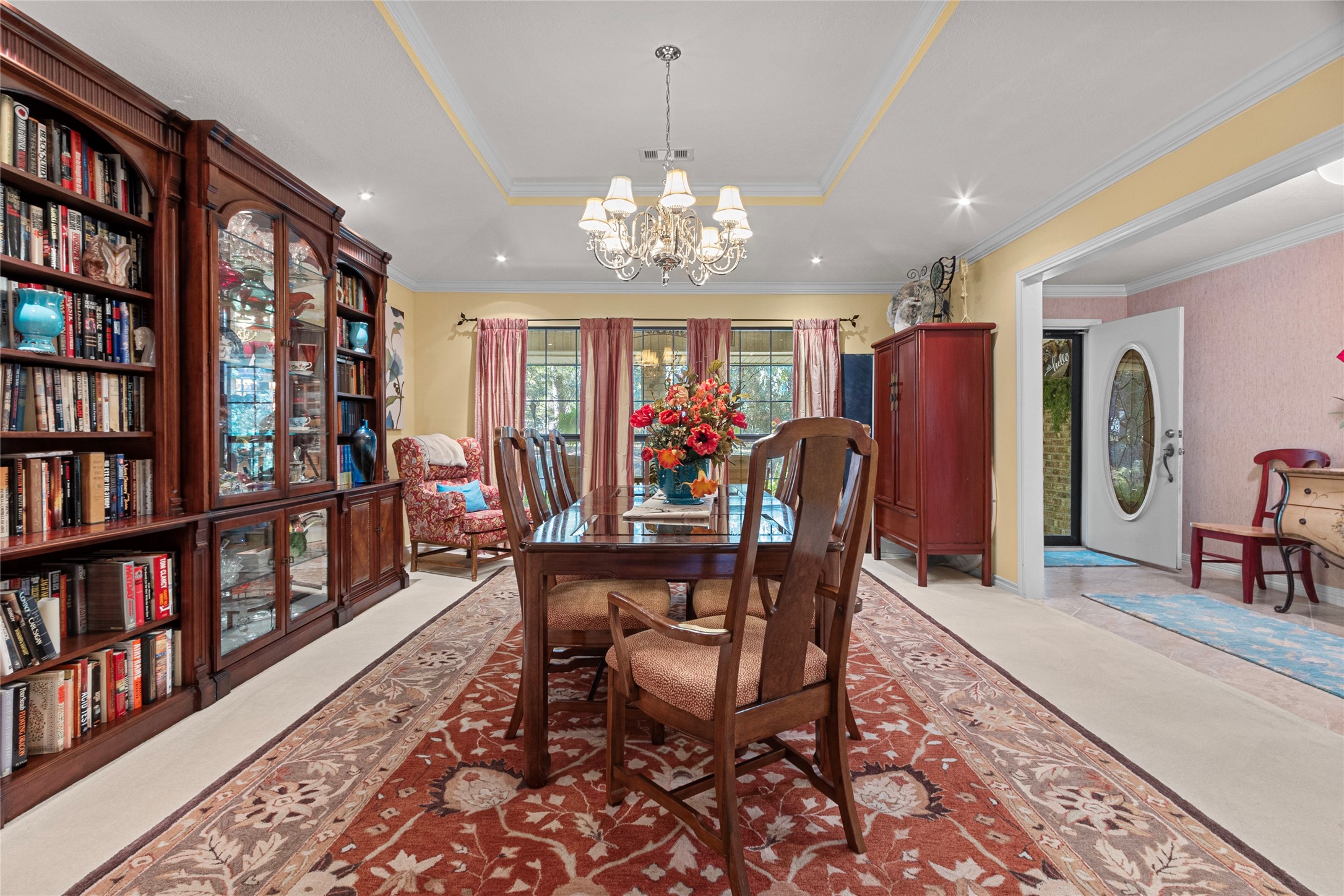 89 Heatley Street Trinity, TX 75862 - Photo 17 of 49 a view of a dining room with furniture and book shelf