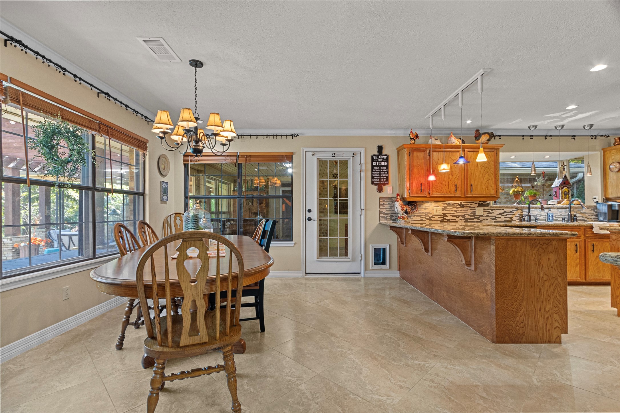 89 Heatley Street Trinity, TX 75862 - Photo 23 of 49 a view of a dining room with furniture window and wooden floor
