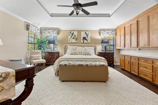 a living room with furniture and windows