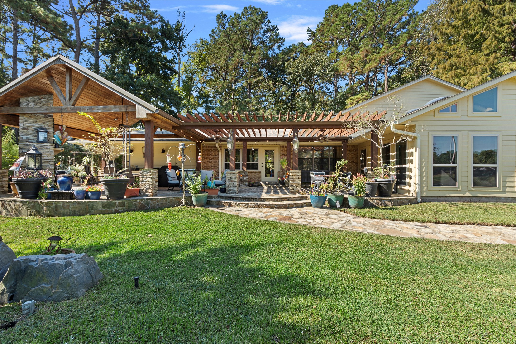 89 Heatley Street Trinity, TX 75862 - Photo 40 of 49 a front view of a house with garden