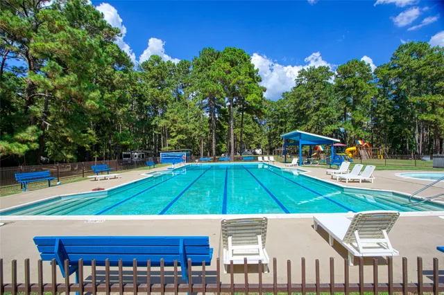 a balcony with view of an outdoor space