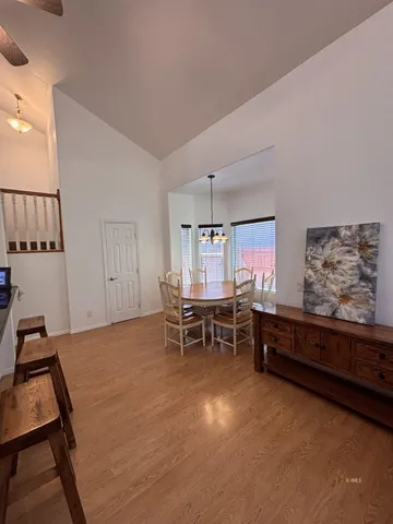 a view of a workspace with furniture and window in livingroom