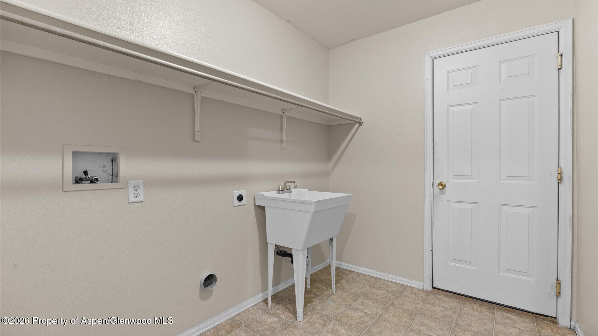 188 Cliff View Circle Parachute, CO 81635 - Photo 31 of 36 a bathroom with a sink and a mirror