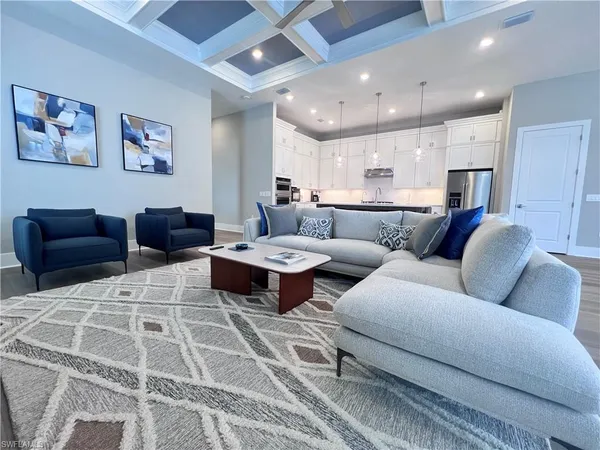 a living room with furniture and a couch