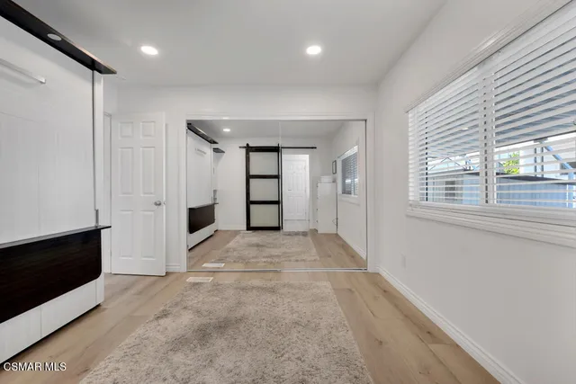 a bathroom with a toilet sink and shower