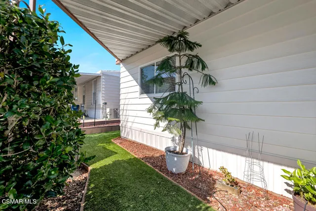 an aerial view of residential house with outdoor space