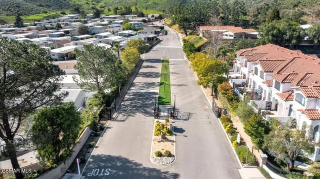 a view of swimming pool with outdoor seating