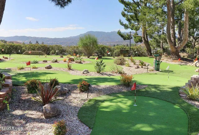 a view of a road with a building in the background