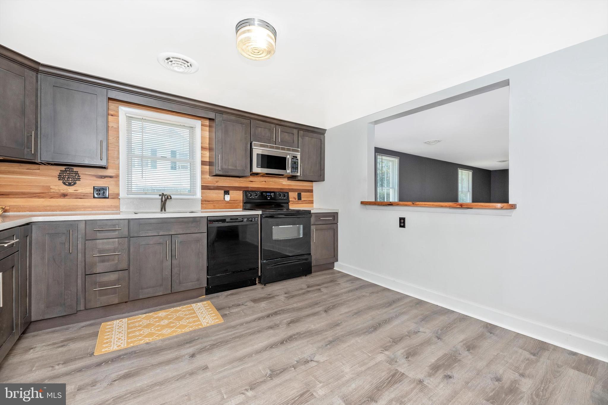 5813 Bartonsville Road Frederick, MD 21704 - Photo 11 of 30 Pass Through Window to Dining Room