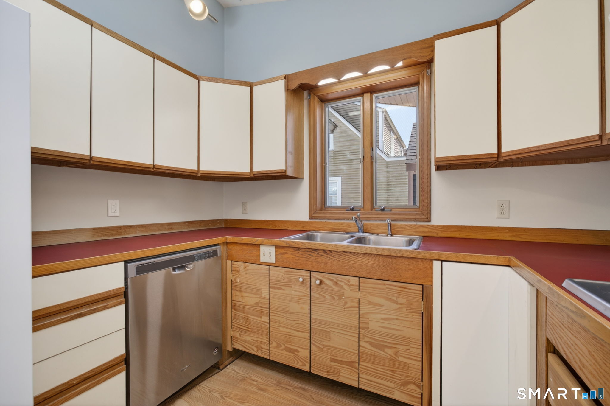 19 High Street Groton, CT 06340 - Photo 11 of 38 a kitchen with stainless steel appliances granite countertop a sink and a cabinets