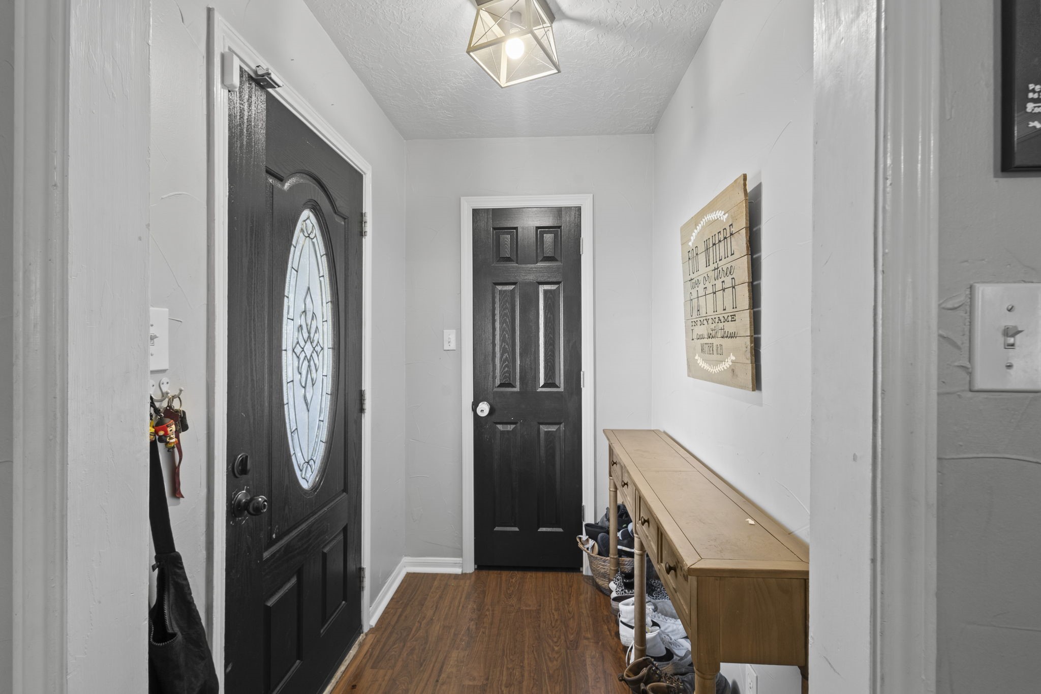 125 Williams Road Lumberton, TX 77657 - Photo 4 of 22 a view of a hallway with wooden floor and staircase