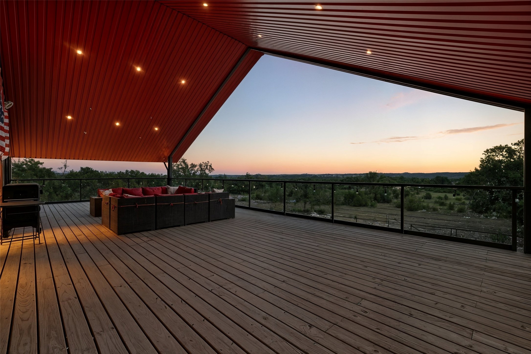 561 Broken Bit Trail Dripping Springs, TX 78620 - Photo 1 of 40 Wooden deck featuring an outdoor hangout area and grilling area