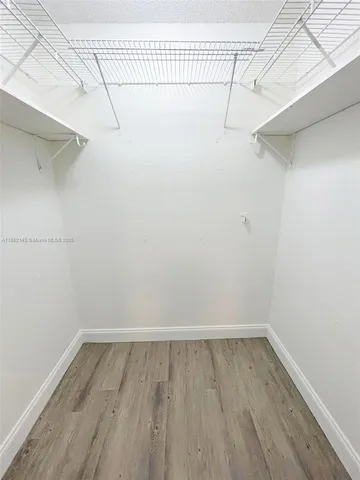 a view of a room with racks on the wall