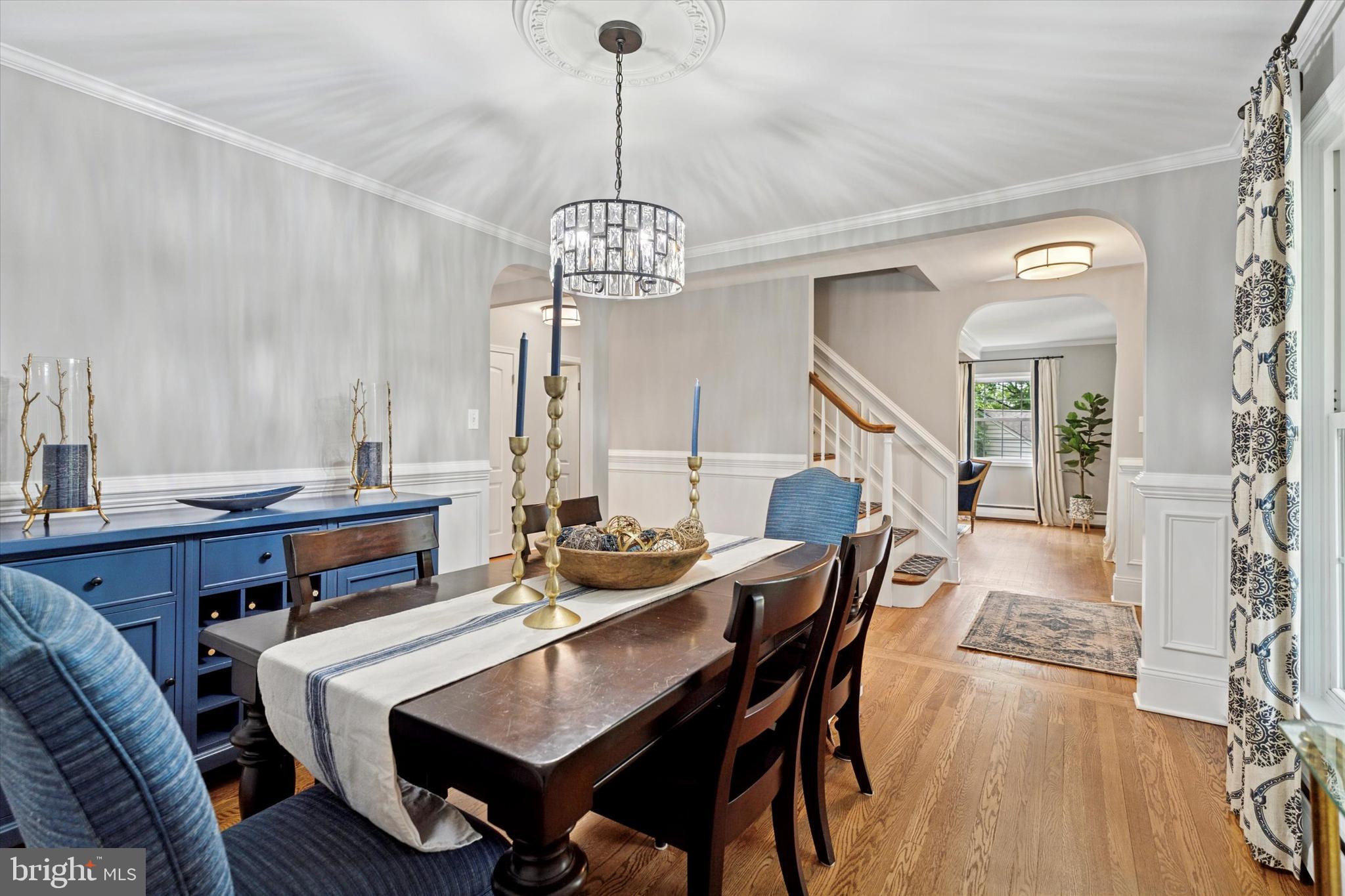 758 North Valley Forge Road Devon, PA 19333 - Photo 11 of 39 a view of a dining room with furniture wooden floor and chandelier