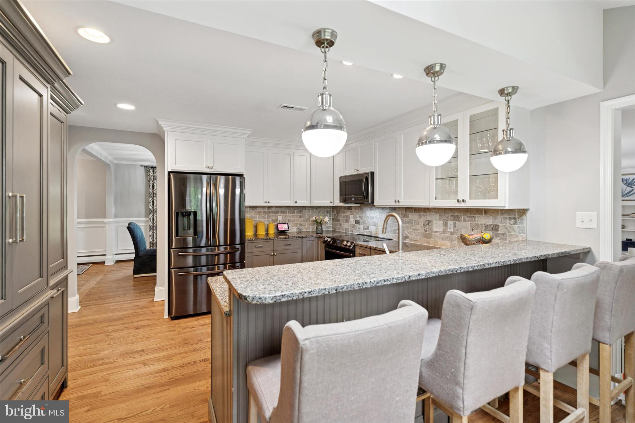 758 North Valley Forge Road Devon, PA 19333 - Photo 13 of 39 a large kitchen with a table and chairs