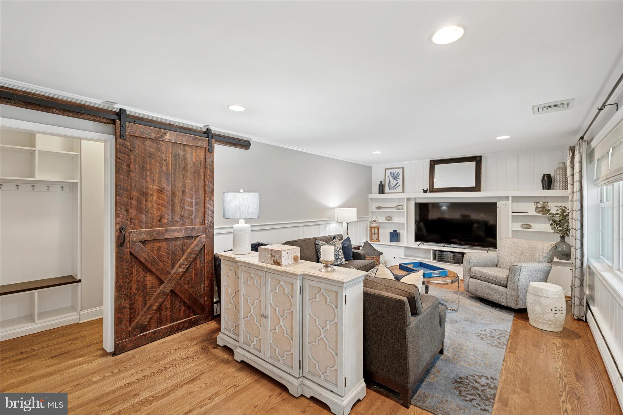 758 North Valley Forge Road Devon, PA 19333 - Photo 17 of 39 a living room with furniture and a flat screen tv