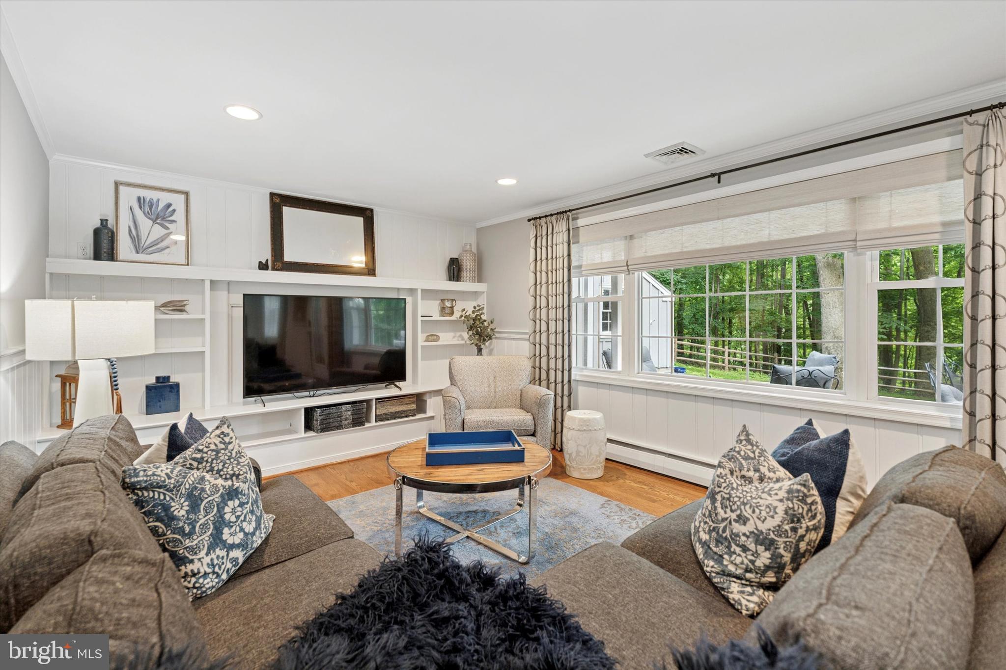 758 North Valley Forge Road Devon, PA 19333 - Photo 18 of 39 a living room with furniture and a flat screen tv