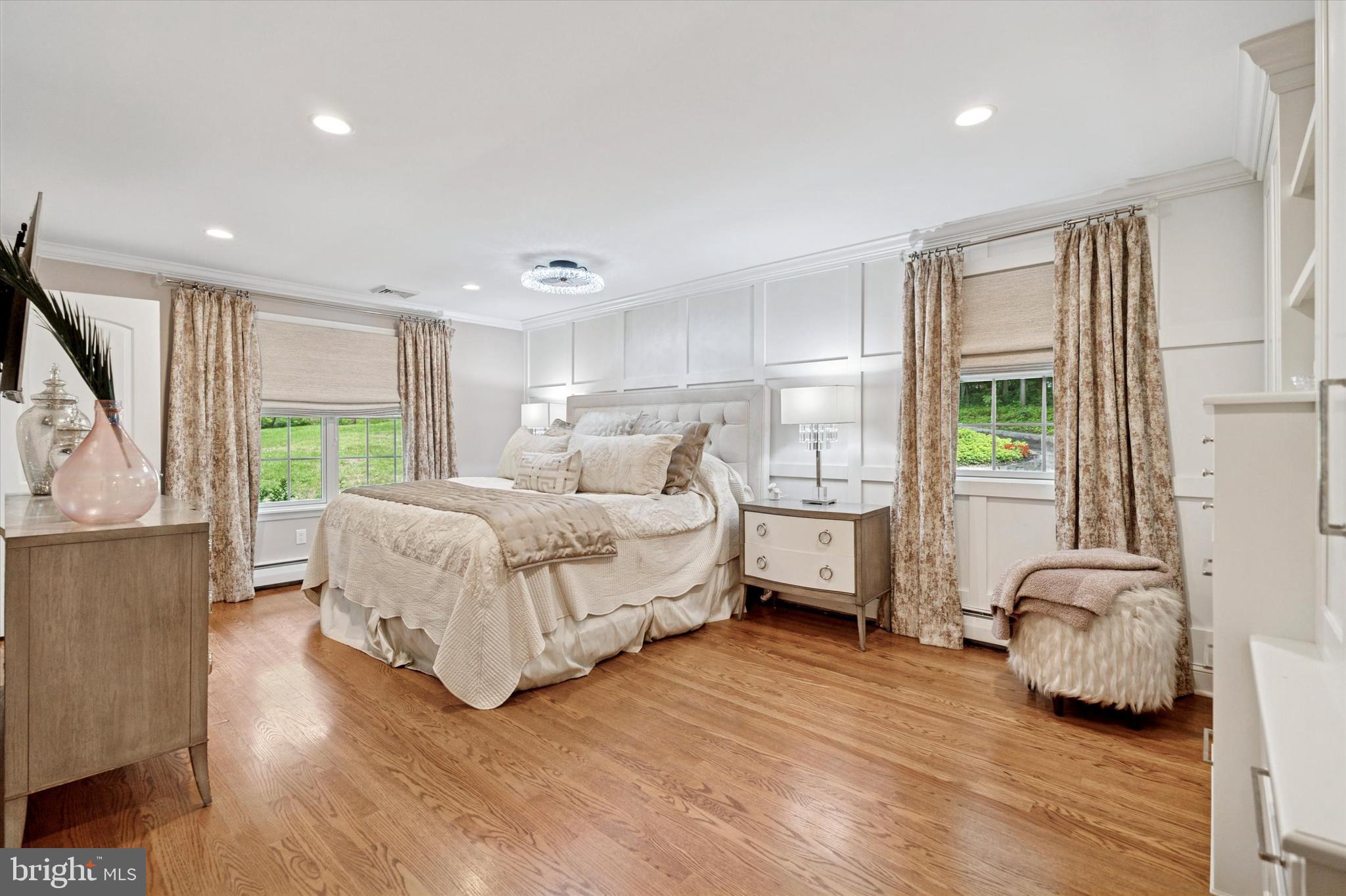 758 North Valley Forge Road Devon, PA 19333 - Photo 19 of 39 a bedroom with a bed and wooden floor