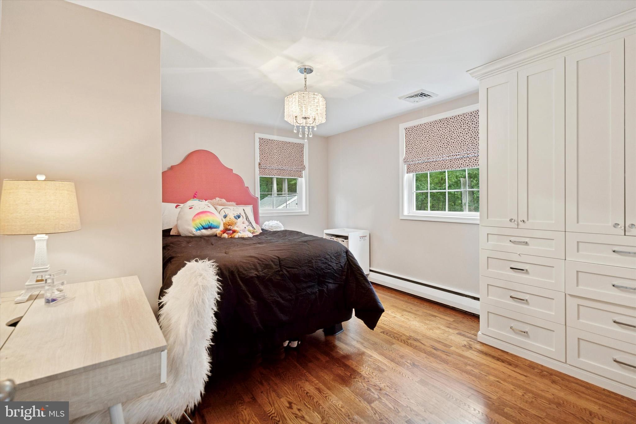 758 North Valley Forge Road Devon, PA 19333 - Photo 29 of 39 a bedroom with a bed and a dresser
