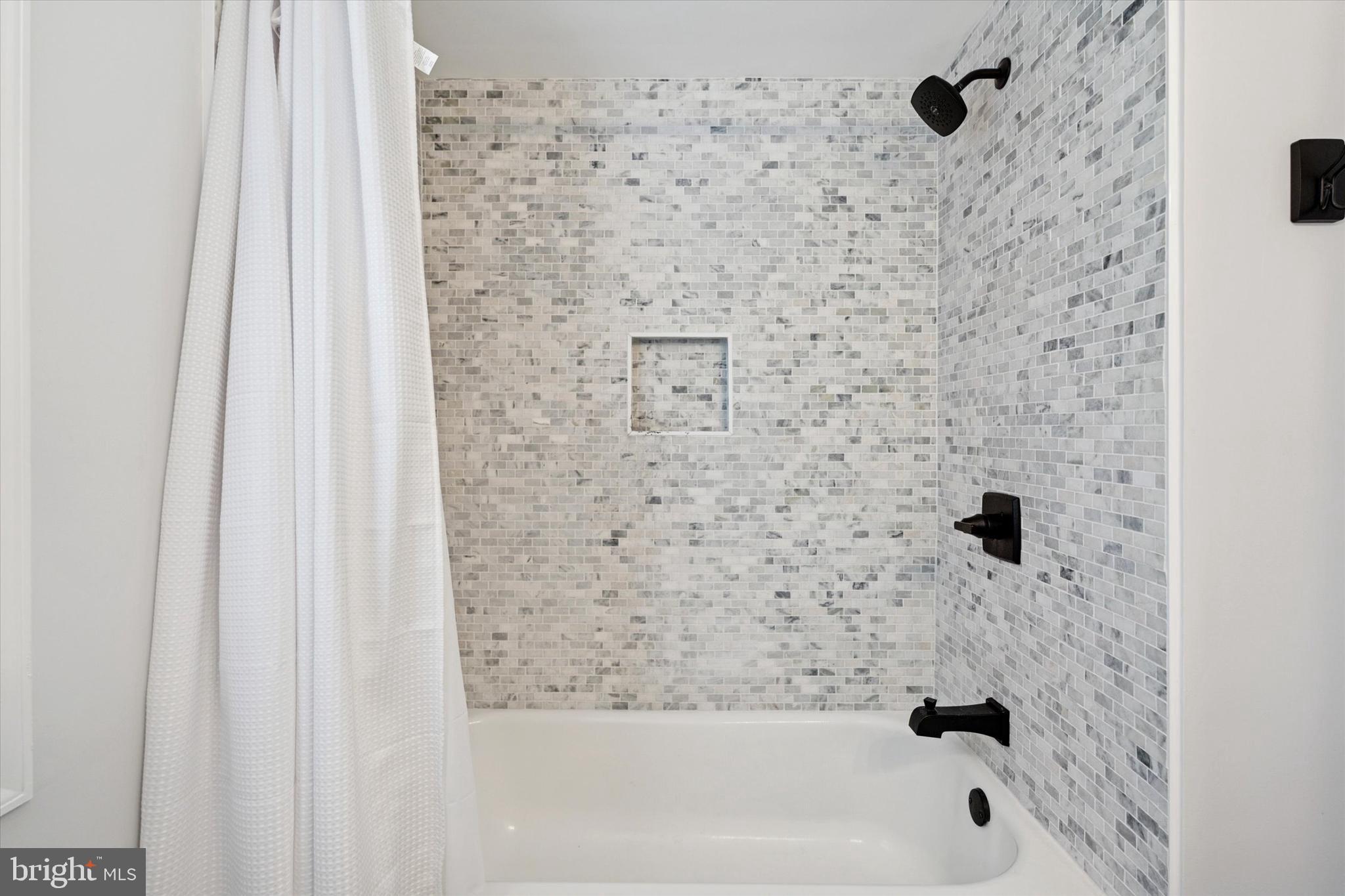 758 North Valley Forge Road Devon, PA 19333 - Photo 31 of 39 a bathroom with a bathtub and shower