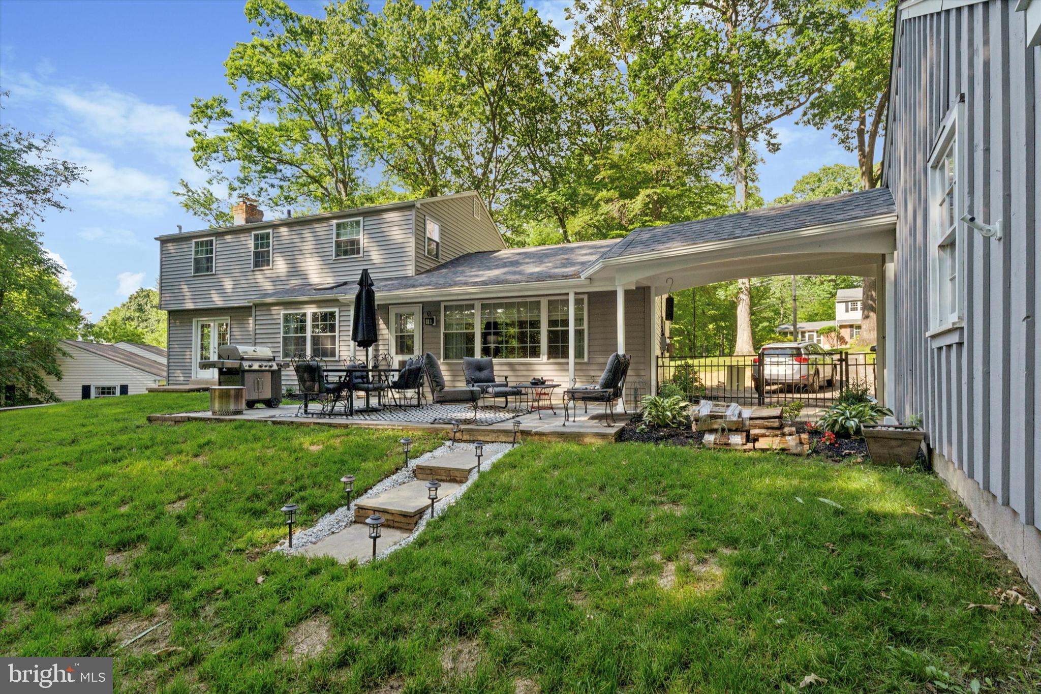 758 North Valley Forge Road Devon, PA 19333 - Photo 5 of 39 a view of a chair and table in backyard of the house