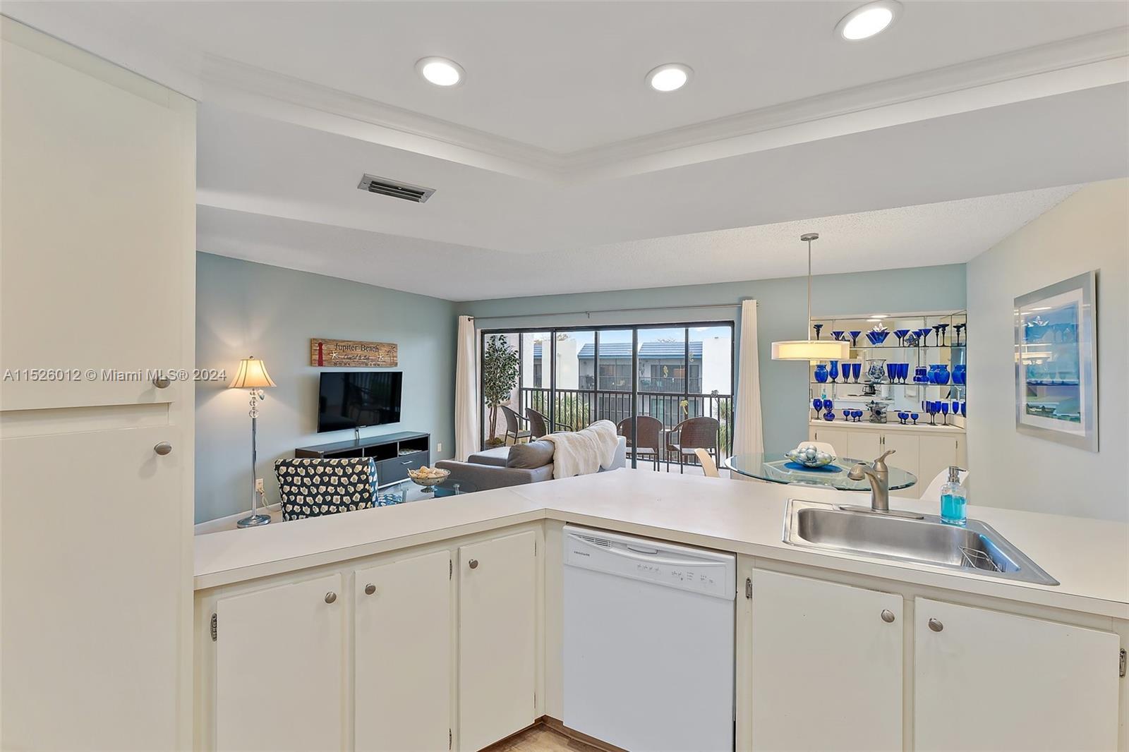 1605 Highway 1, Unit A406 Jupiter, FL 33477 - Photo 13 of 26 a very nice looking room with a large window