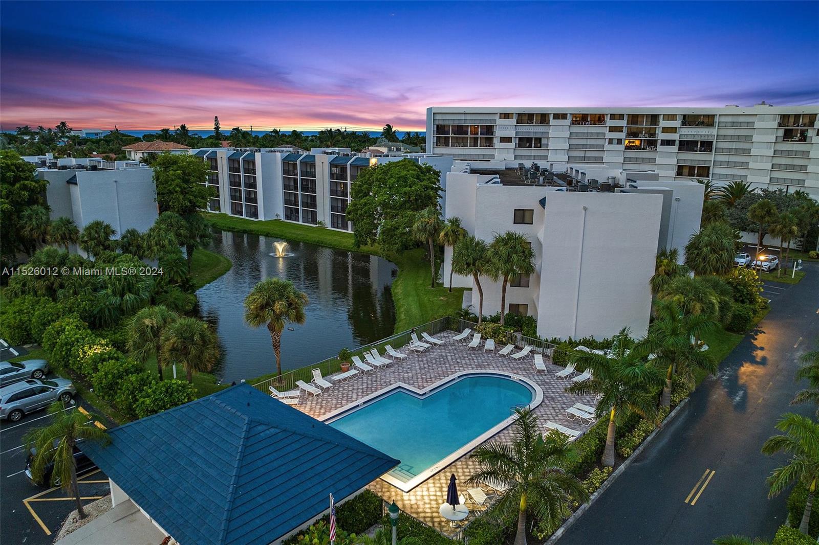 1605 Highway 1, Unit A406 Jupiter, FL 33477 - Photo 3 of 26 a view of a balcony with chairs