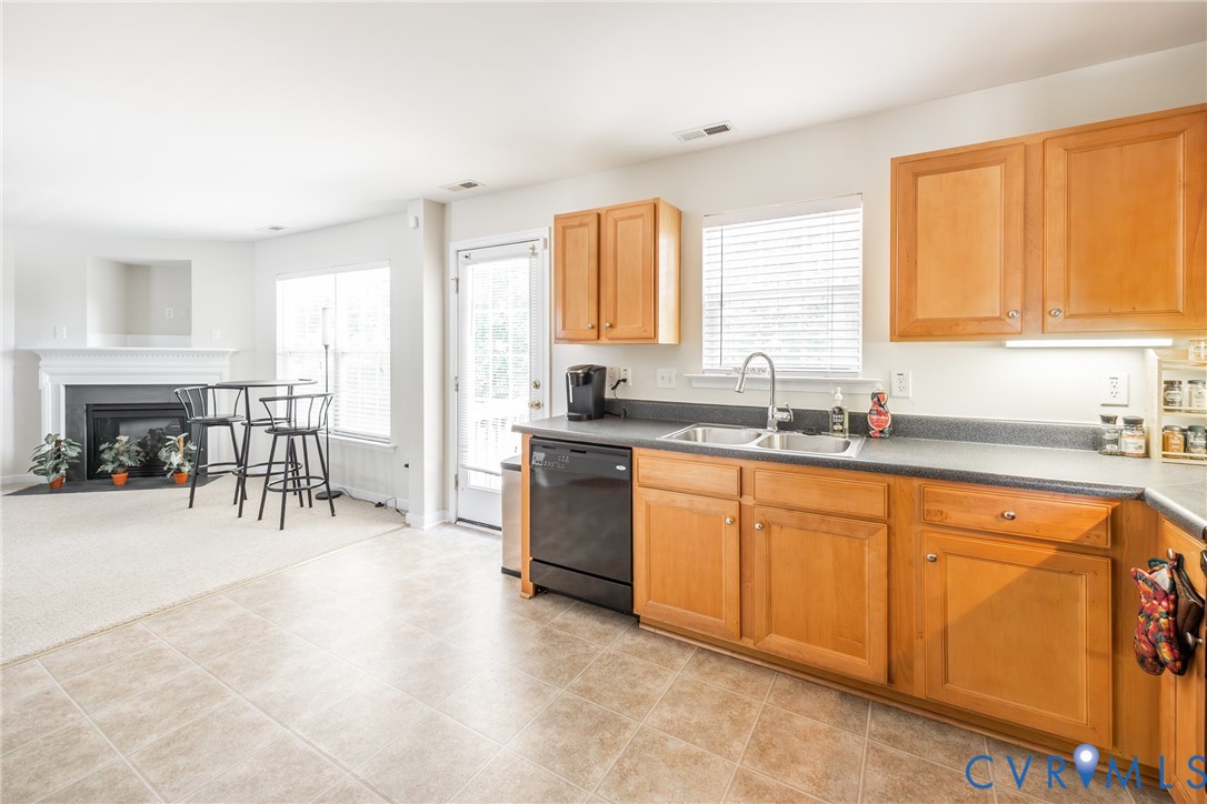 2928 Heather Ridge Drive Henrico, VA 23231 - Photo 13 of 34 Kitchen featuring natural wood-finish cabinetry, a