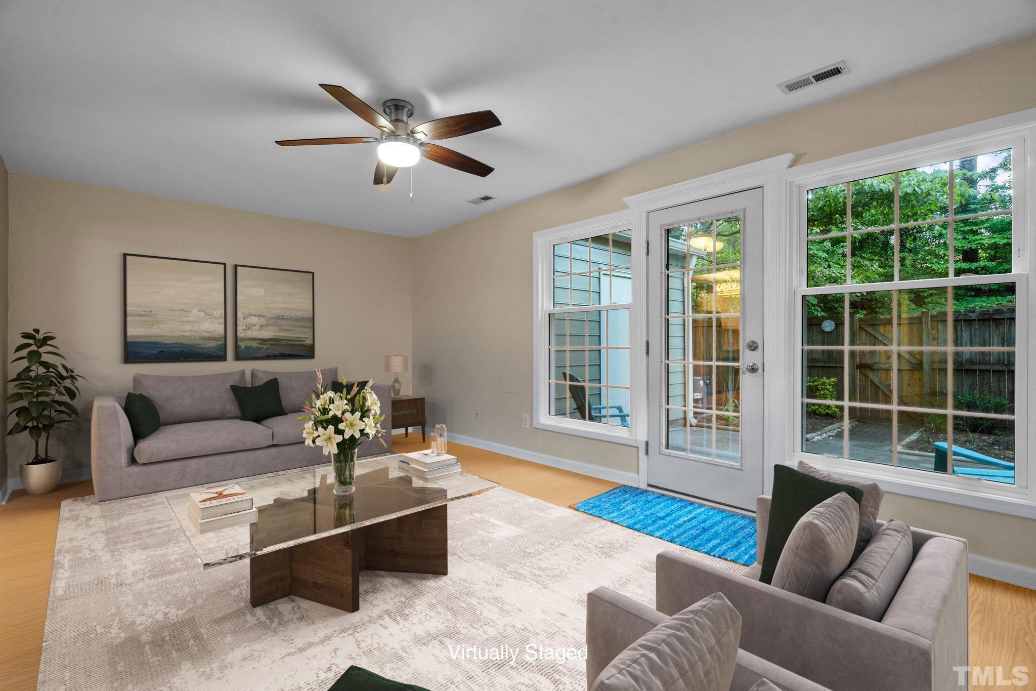 3169 Morningside Drive Raleigh, NC 27607 - Photo 23 of 36 a living room with furniture and a large window