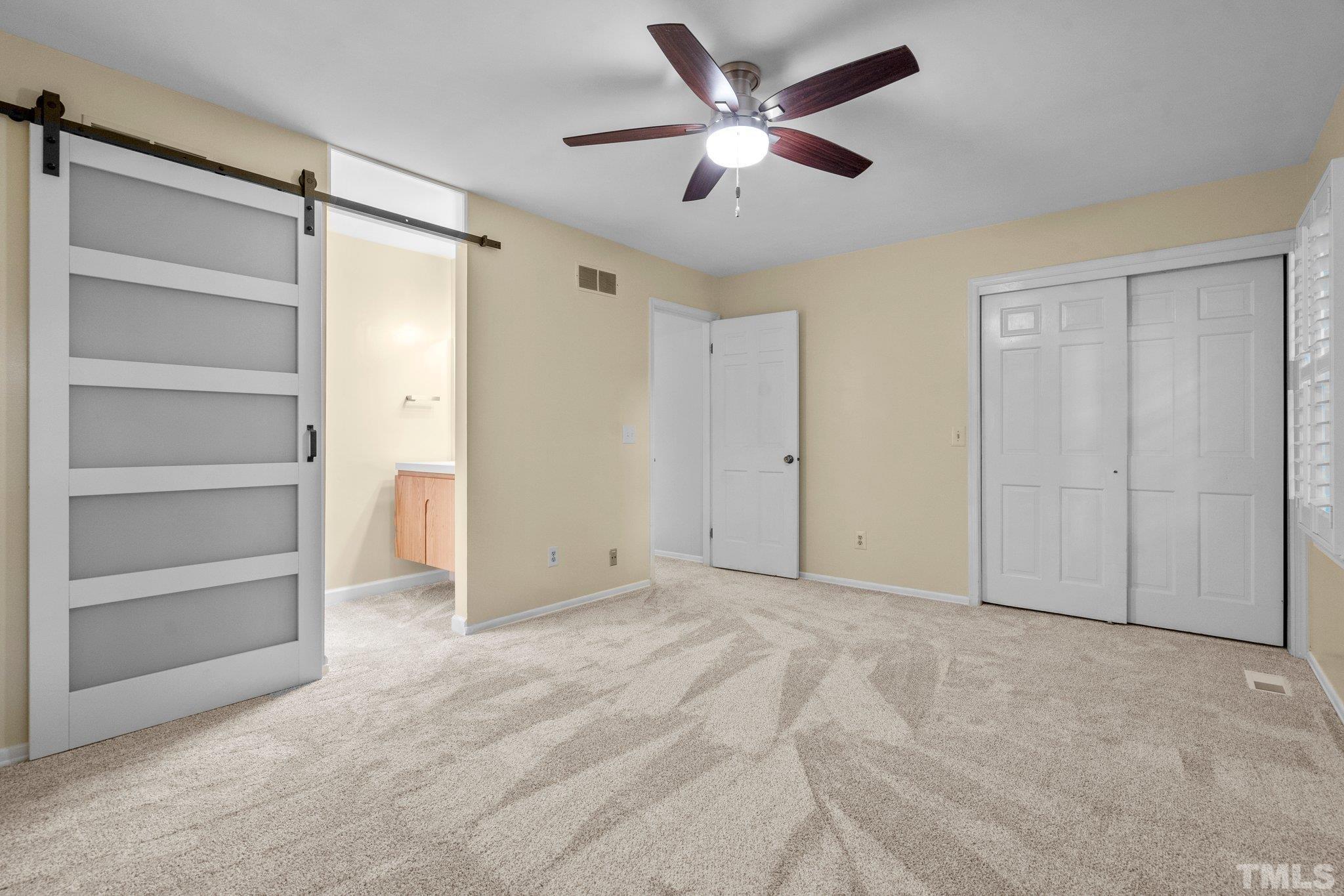 3169 Morningside Drive Raleigh, NC 27607 - Photo 29 of 36 a view of an empty room and a ceiling fan