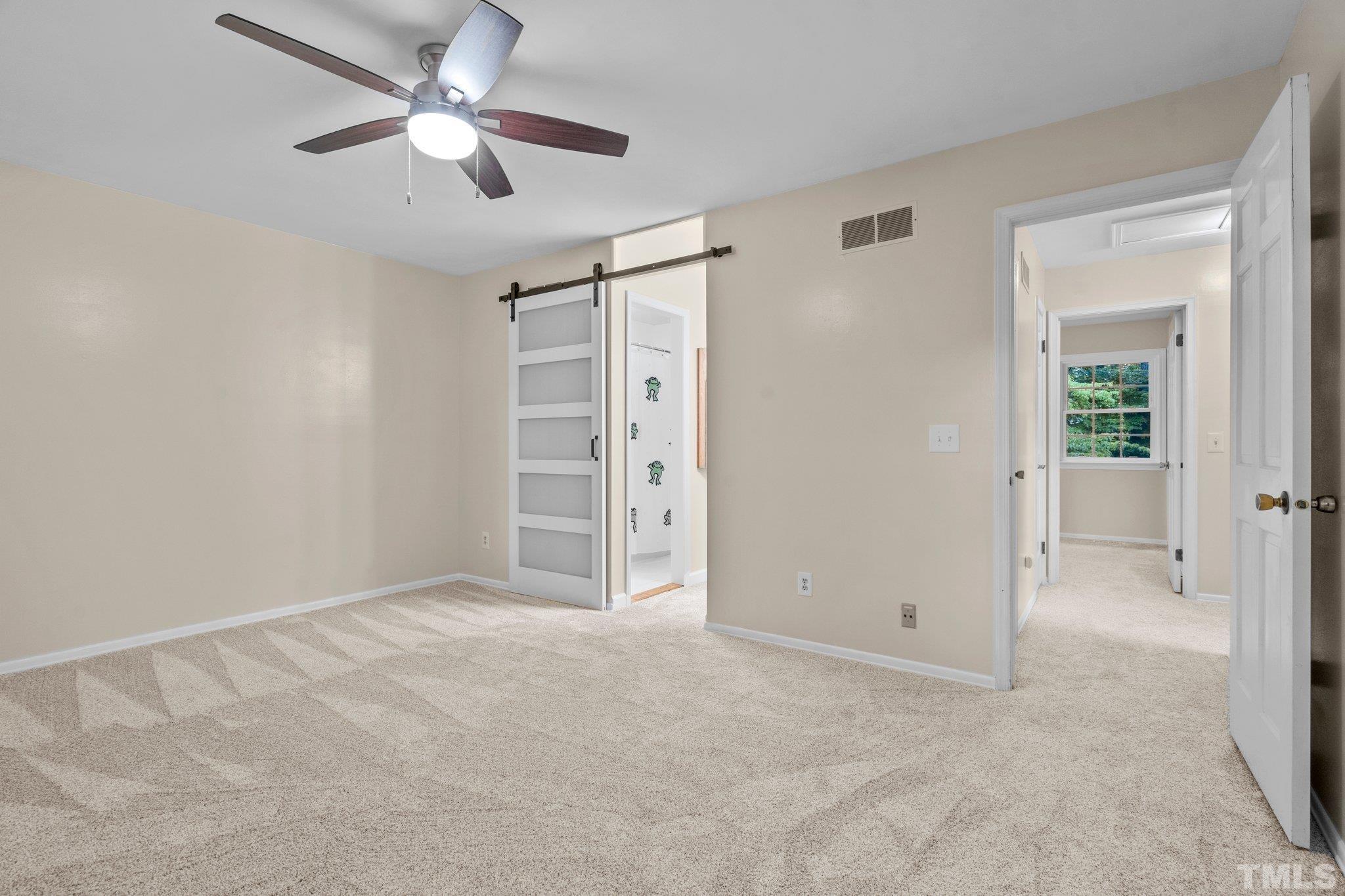 3169 Morningside Drive Raleigh, NC 27607 - Photo 34 of 36 a view of empty room with ceiling fan