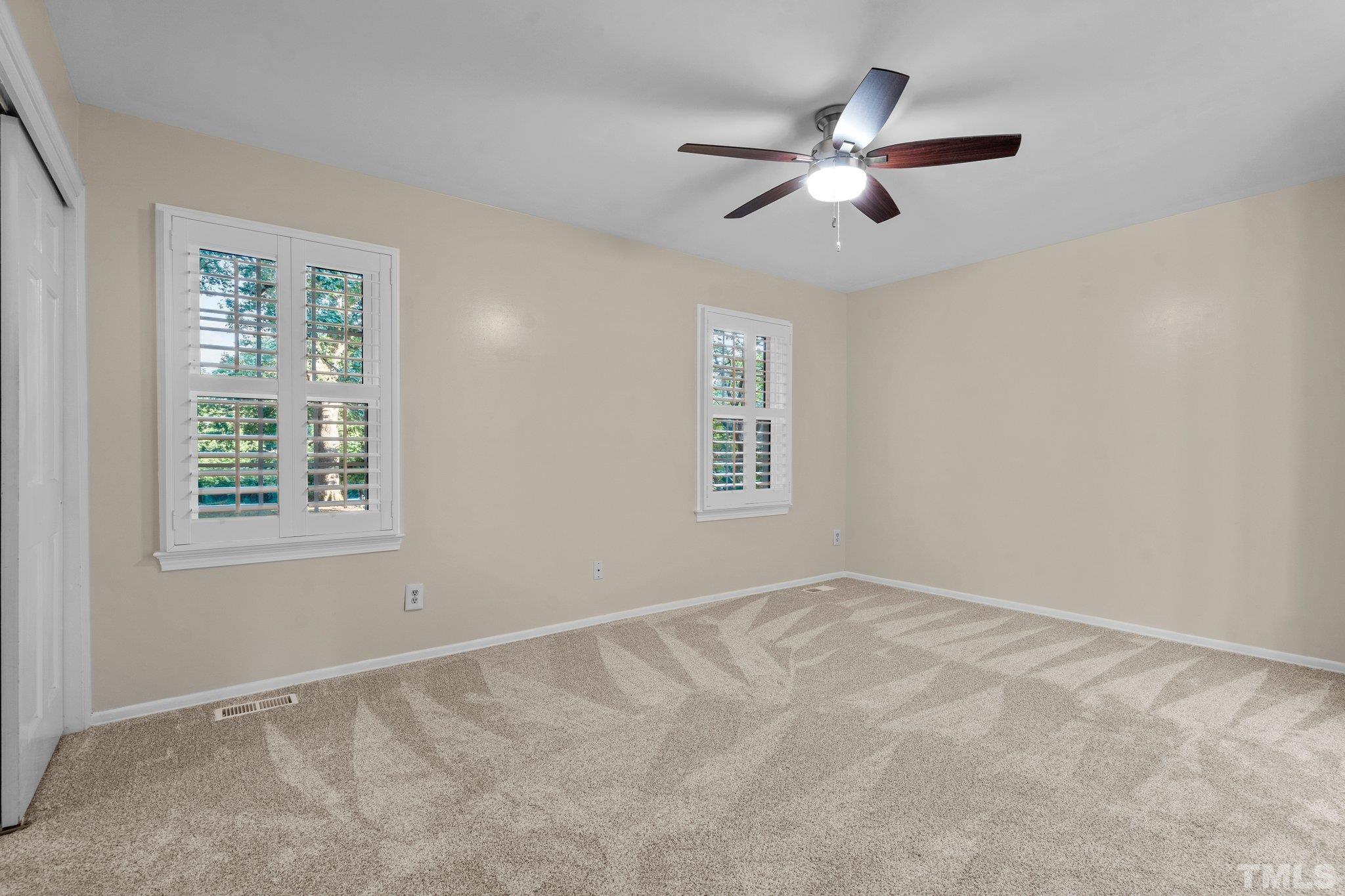 3169 Morningside Drive Raleigh, NC 27607 - Photo 35 of 36 a view of an empty room with a window