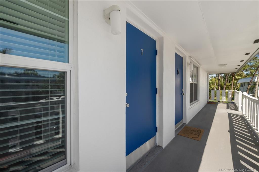 2929 Southeast Ocean Boulevard, Unit K7 Stuart, FL 34996 - Photo 3 of 18 a view of a hallway