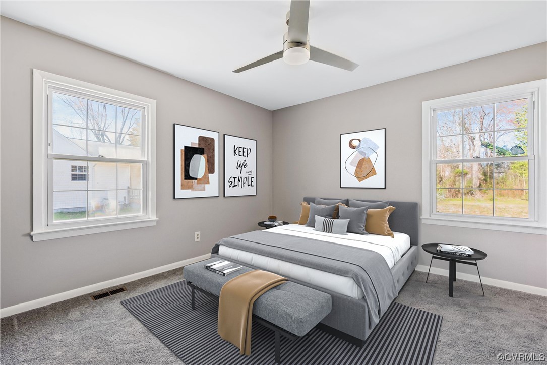 607 Queens Creek Road Williamsburg, VA 23185 - Photo 9 of 13 a bedroom with a bed and a window