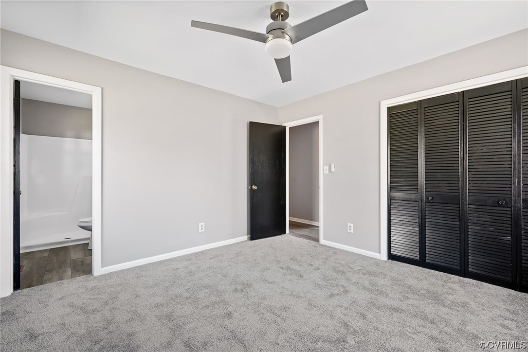 607 Queens Creek Road Williamsburg, VA 23185 - Photo 10 of 13 en empty room with closet and a ceiling fan