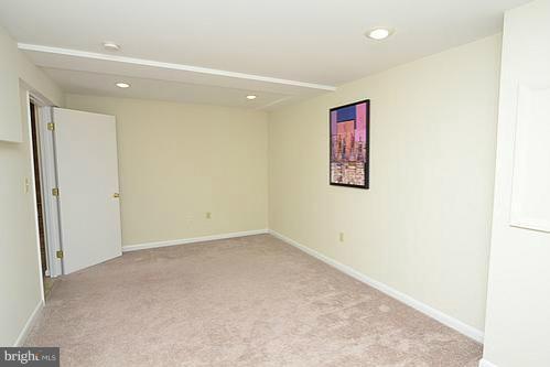 6825 Montgomery Road Elkridge, MD 21075 - Photo 2 of 18 Lower Level Family Room/Den