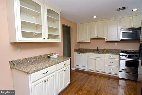 6825 Montgomery Road Elkridge, MD 21075 - Photo 16 of 18 New Kitchen w Granite, Stainless & Hardwood