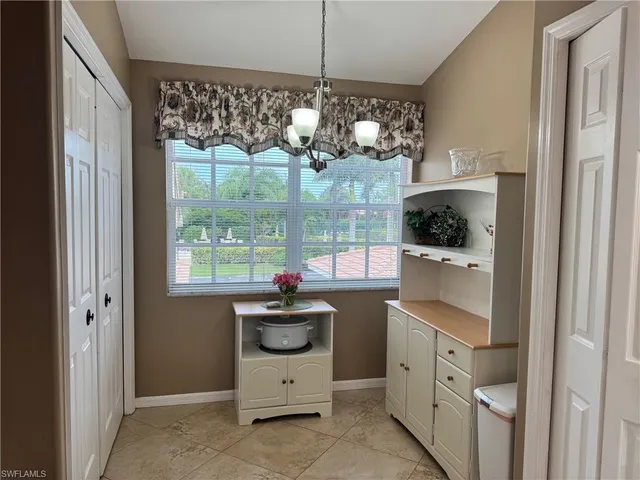 a view of a kitchen with a sink and dishwasher kitchen view