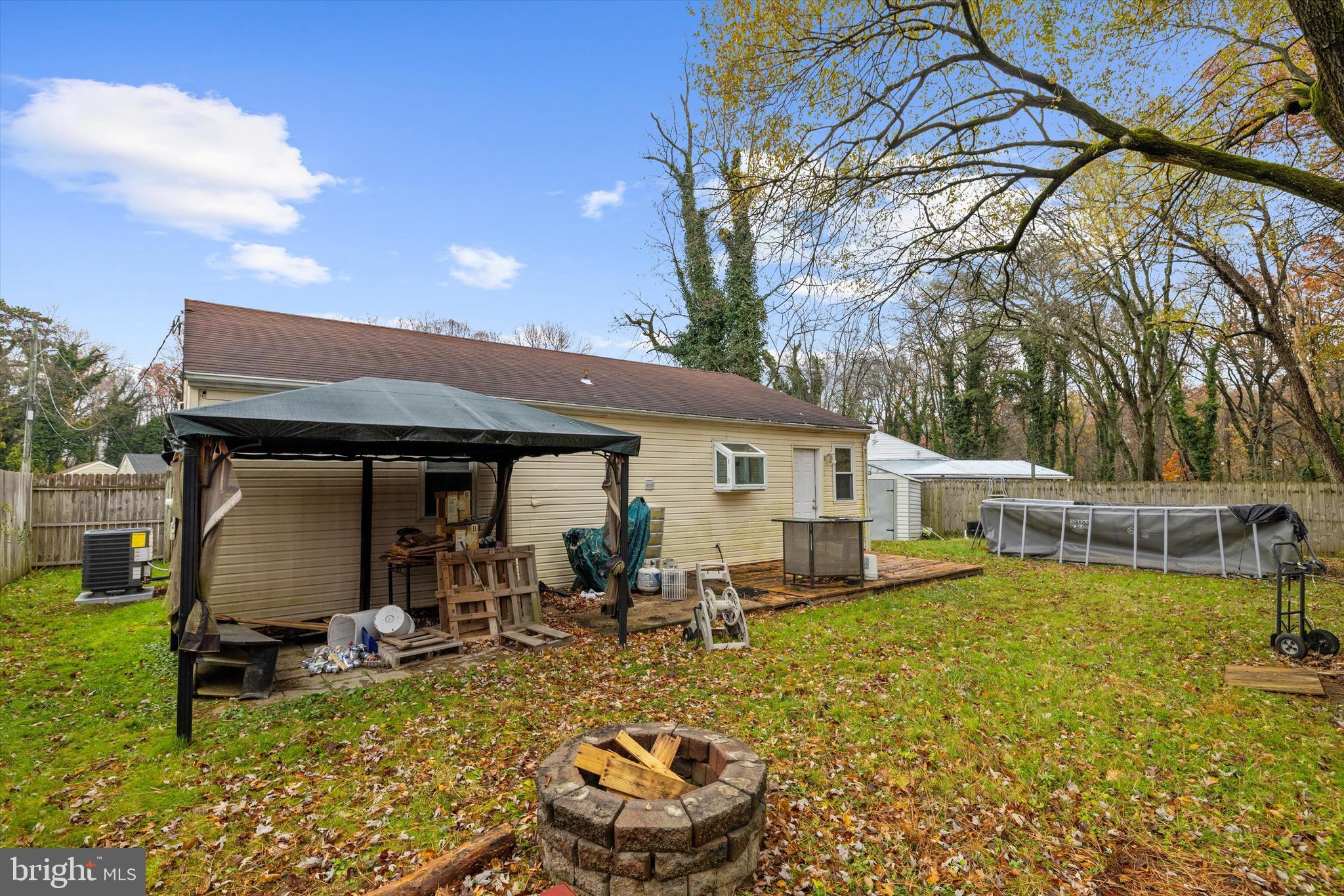 1921 Norwich Road Glen Burnie, MD 21061 - Photo 24 of 37 a view of a house with swimming pool and sitting area
