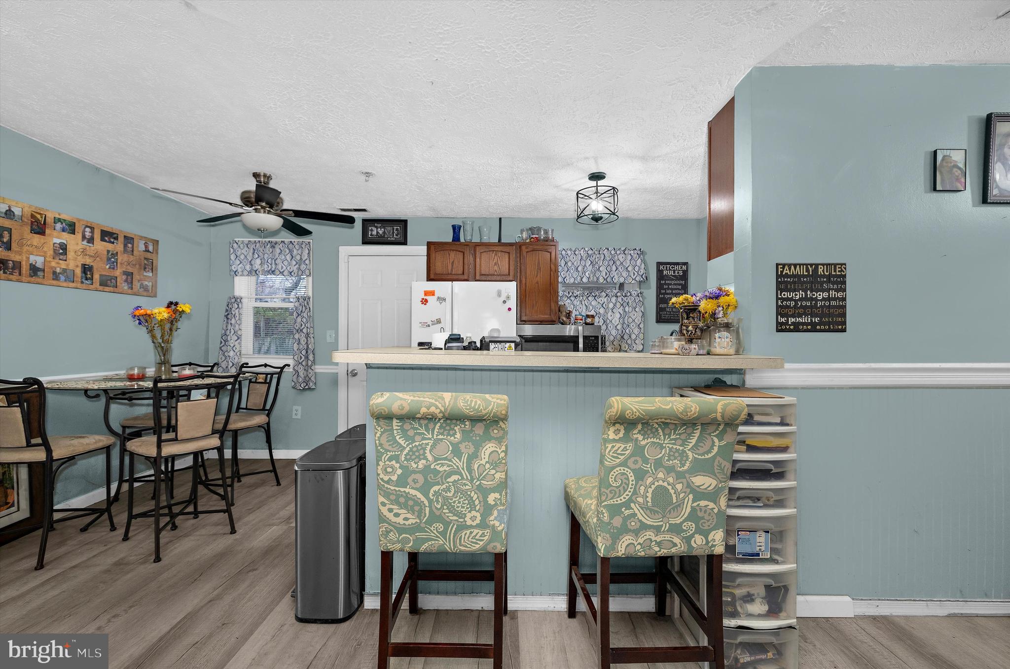 1921 Norwich Road Glen Burnie, MD 21061 - Photo 9 of 37 a dining room with furniture and wooden floor