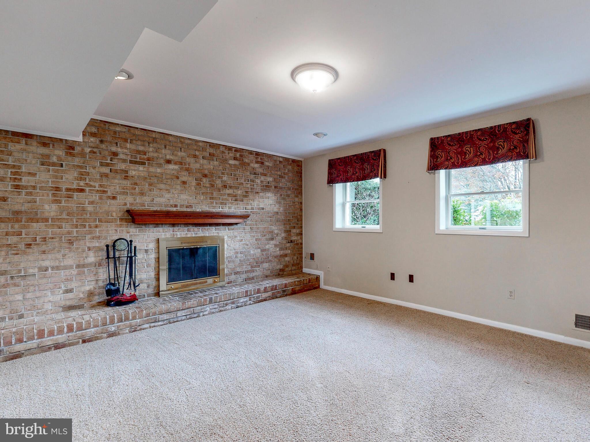 2628 Thornbrook Road Ellicott City, MD 21042 - Photo 26 of 38 Family Room With Wood-Burning Fireplace