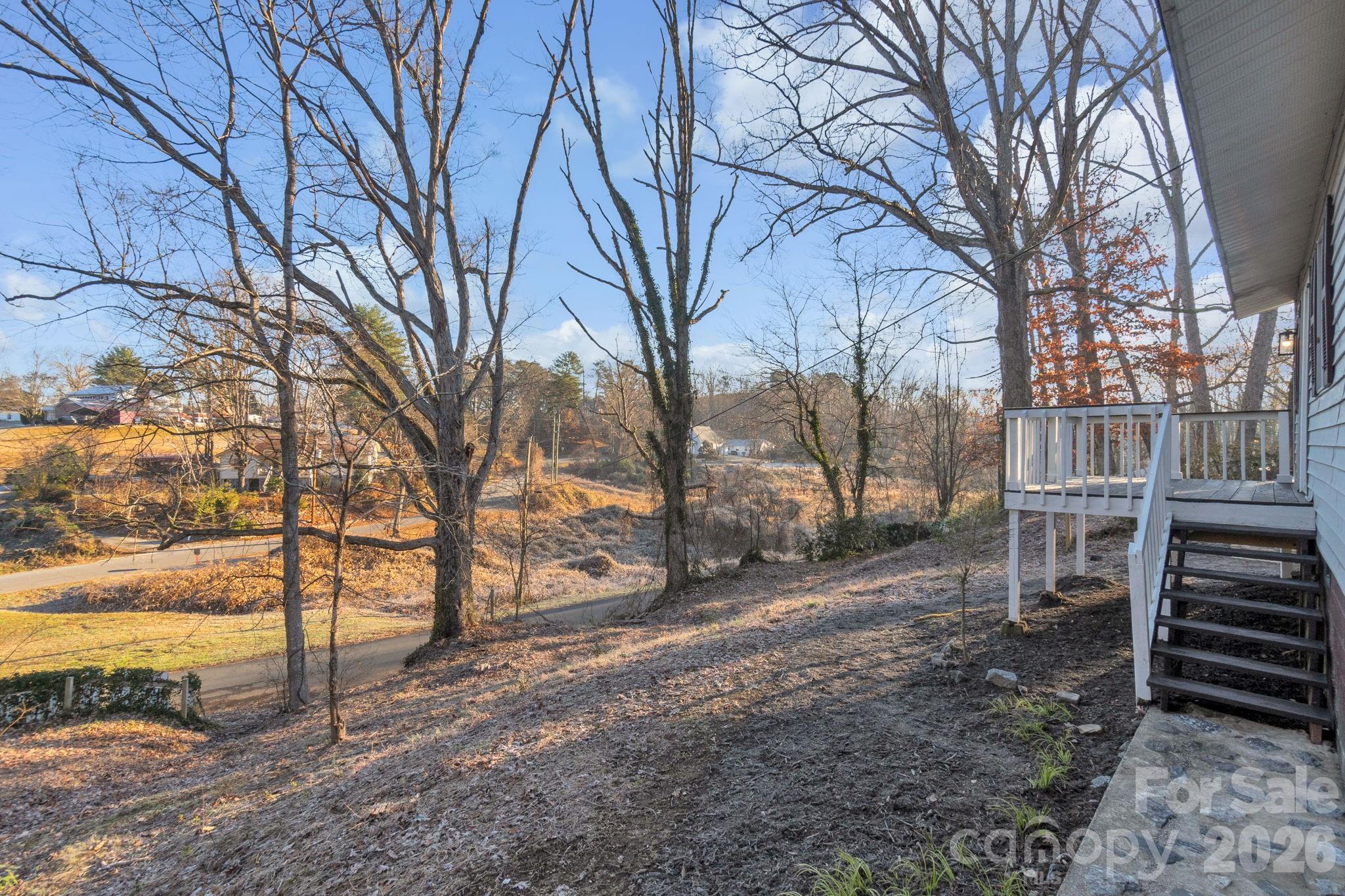 49 East Livingston Street Tryon, NC 28782 - Photo 24 of 27 a view of outdoor space with wooden fence