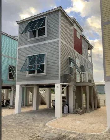 a front view of a house with a garage