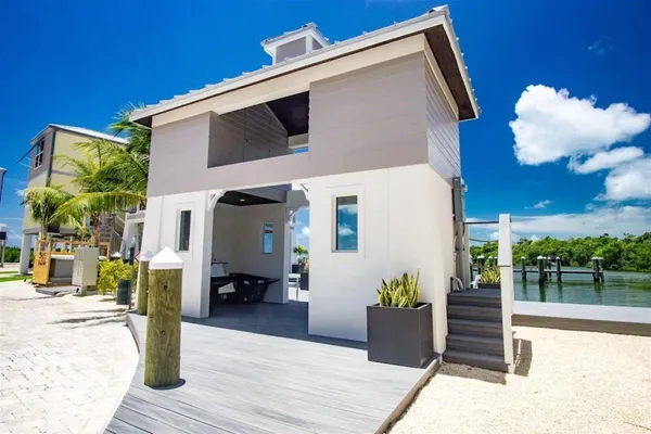 a front view of a house with dining area
