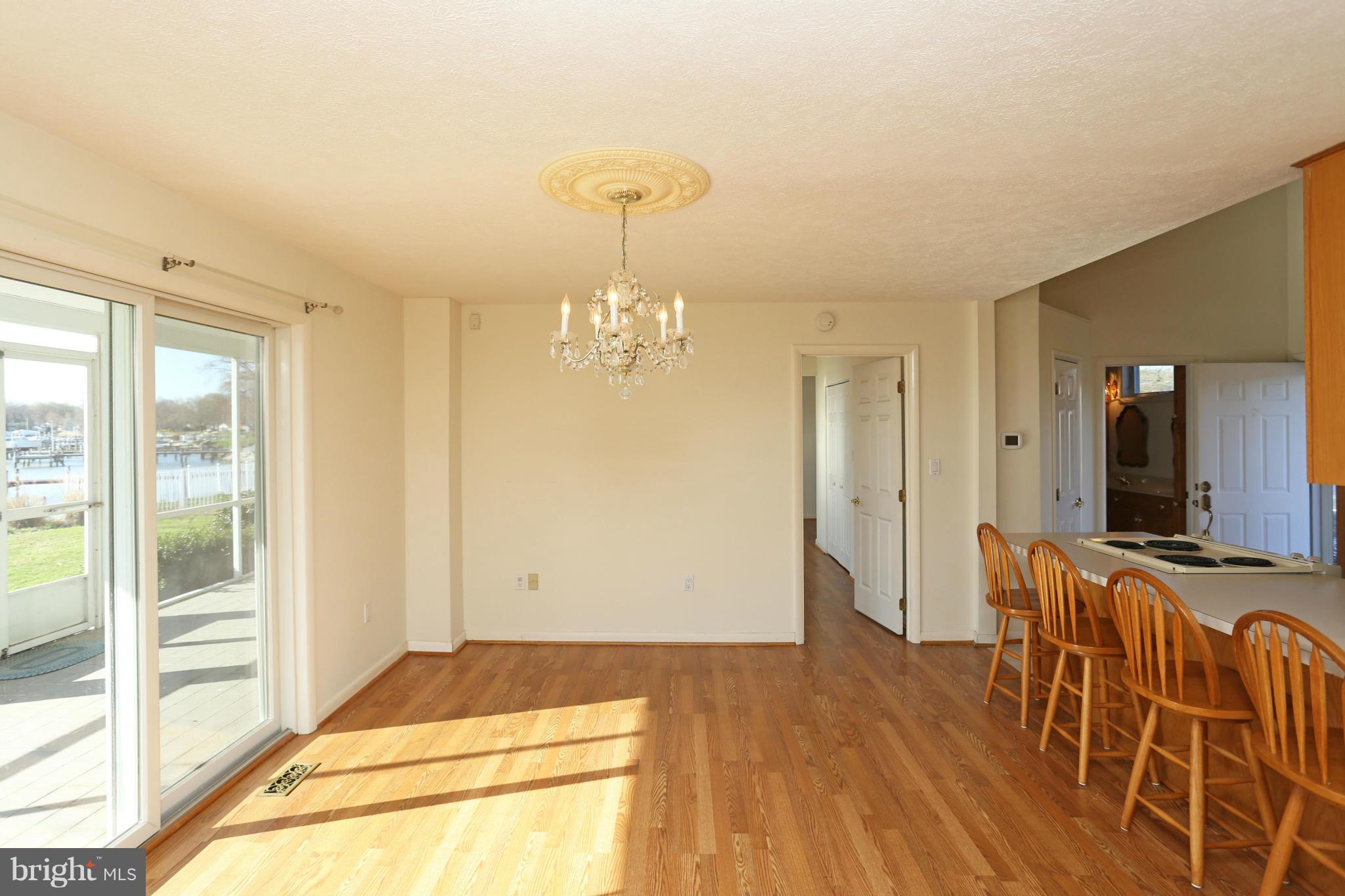 8131 Orchard Point Road Pasadena, MD 21122 - Photo 19 of 30 Dining Room