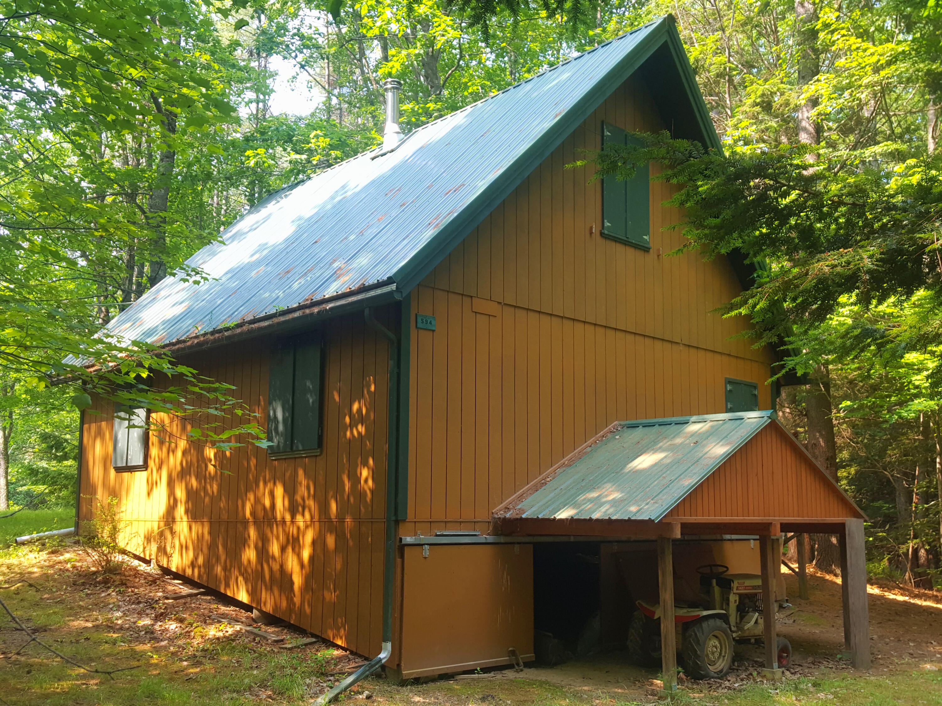 594 River Road Windham, ME 04062 - Photo 9 of 43 Cottage rear with storage under