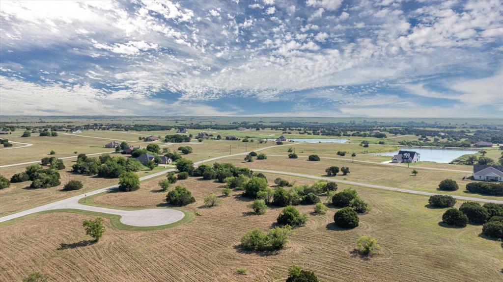 7308 Castle Royle Court Cleburne, TX 76033 - Photo 6 of 35 Aerial view with a water view and a rural view
