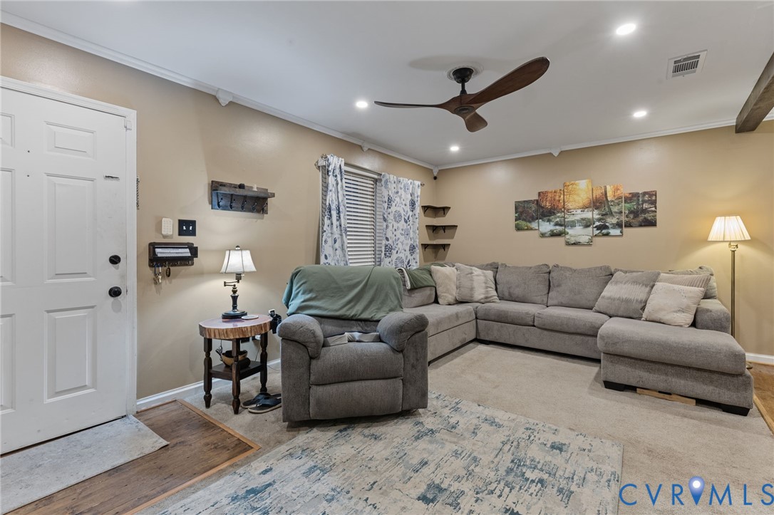 15601 Roland View Drive Chester, VA 23831 - Photo 3 of 18 a living room with furniture and a ceiling fan