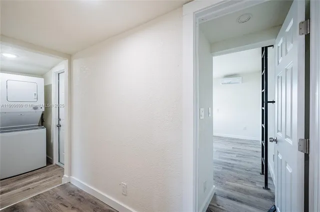 a view of small space with wooden floor